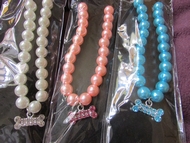 Collier Perle bleu, rose ou blanc et Bijou Os en strass